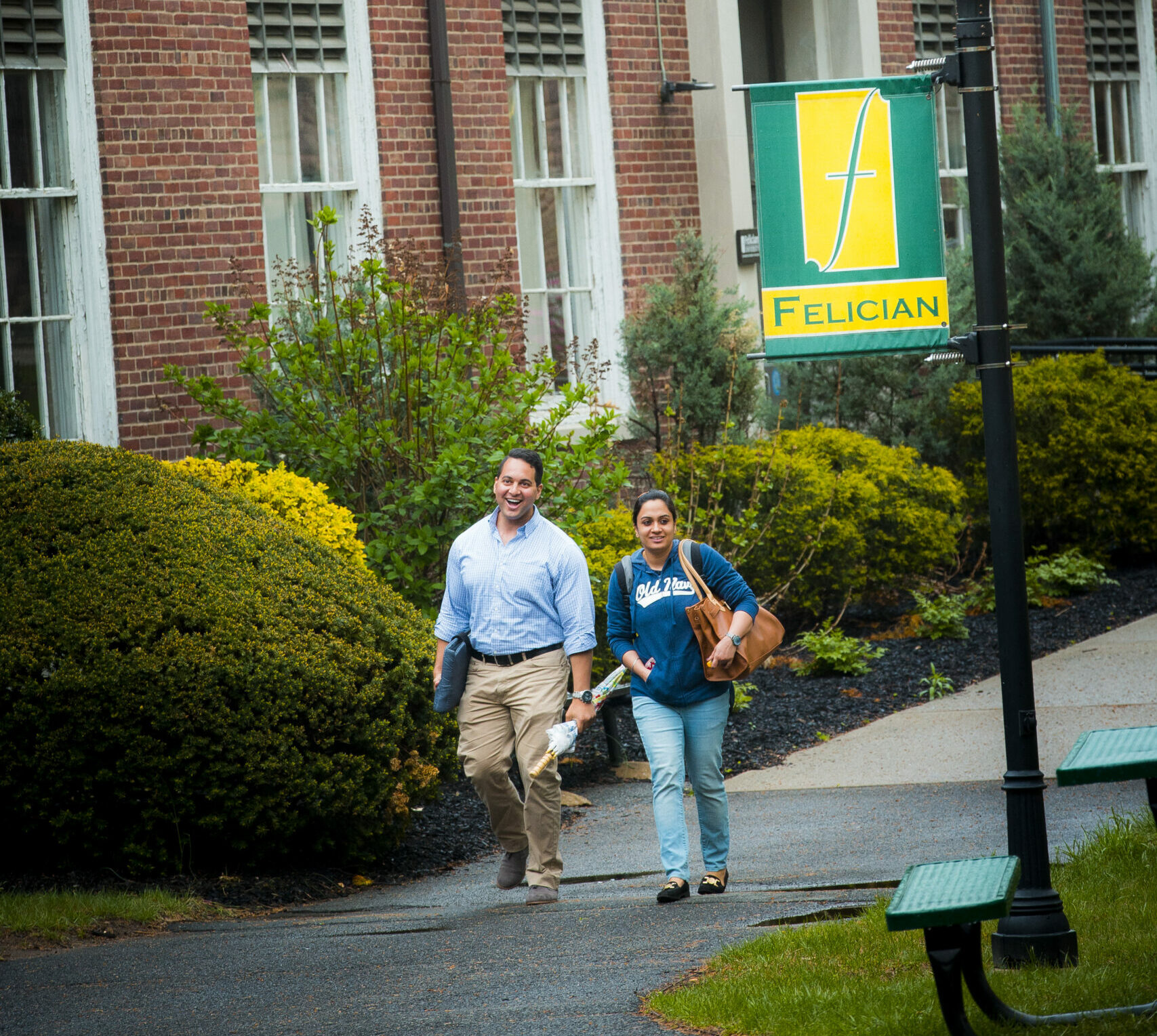 Man and Women Walking on Rutherford Campus